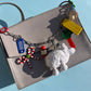 Counting sheep bag charm / necklace Clowncore
